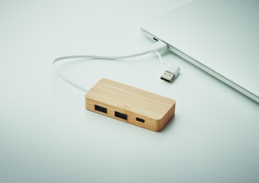 Logotrade meene foto: Bambusest USB 3 pordiga jaotur