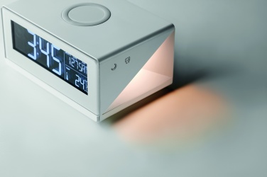 Logotrade korporatīvās dāvanas foto: LED pulkstenis un bezvadu lādētājs 5W